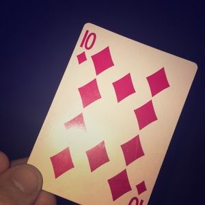 A single 10 of diamonds card